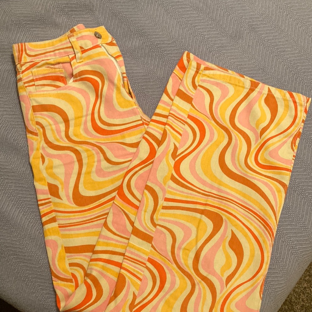 Multi colored High waisted, wide leg flare jeans.